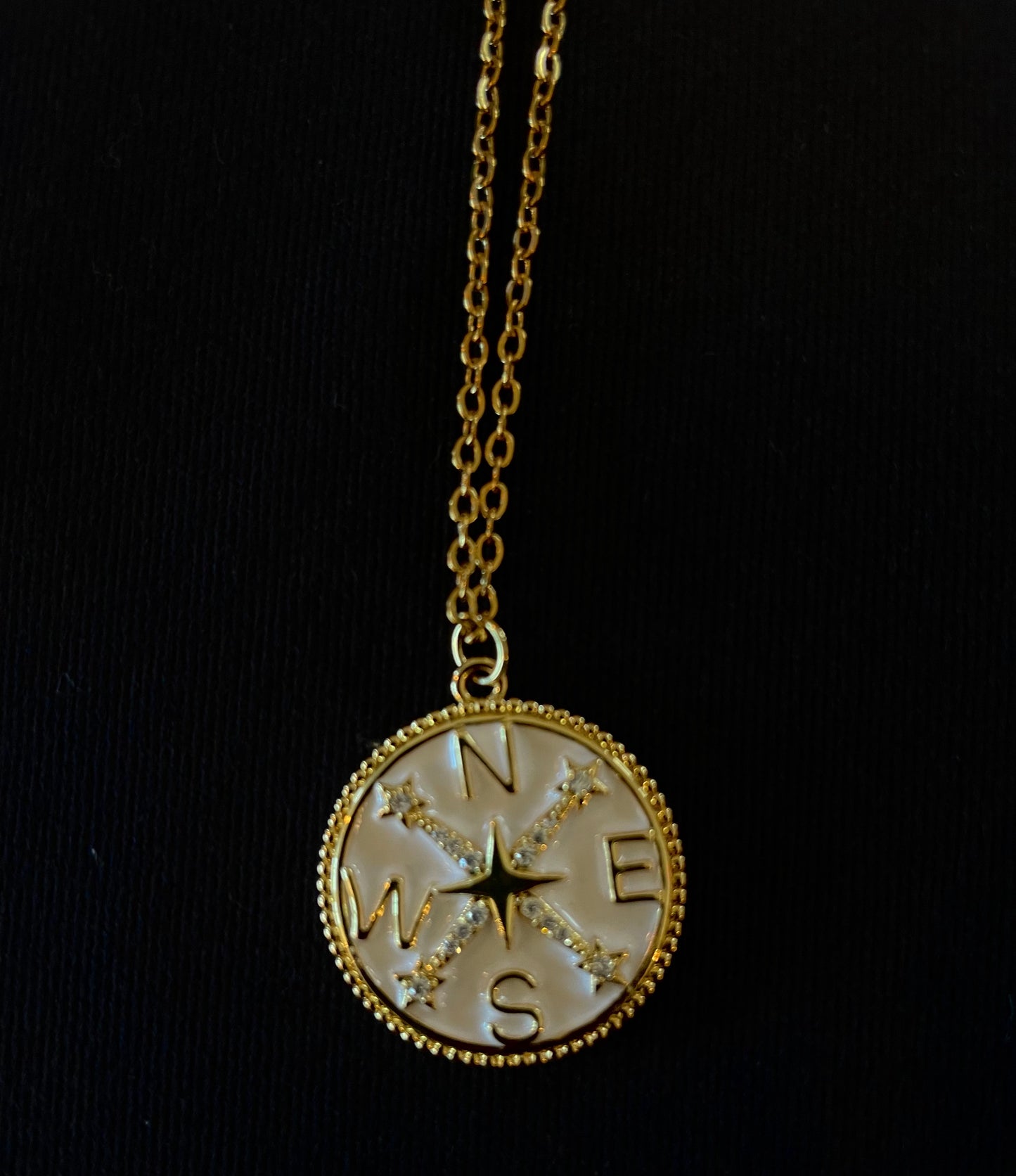 White compass rhinestone pendant